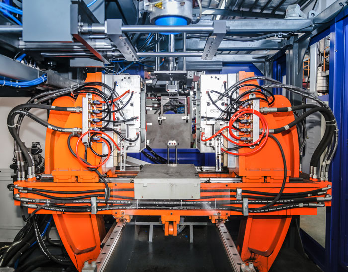 Detalles de una máquina de extrusión-soplado, vista 2